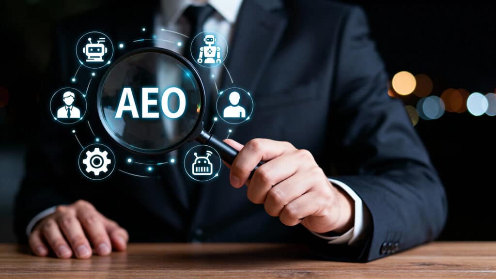 Business professional examining AEO concept with magnifying glas