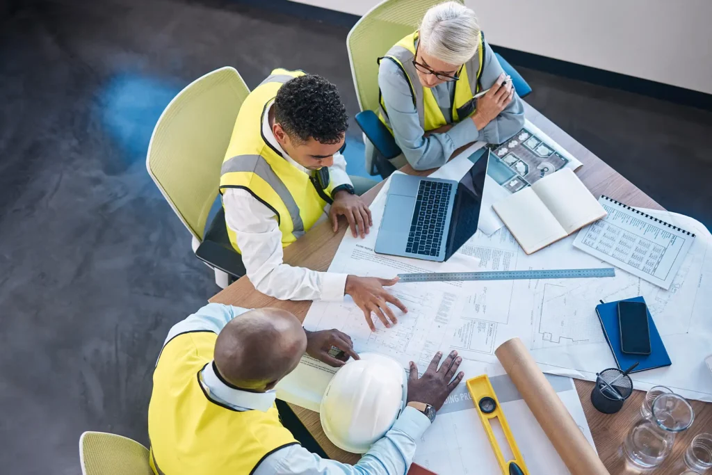 team in meeting above for construction